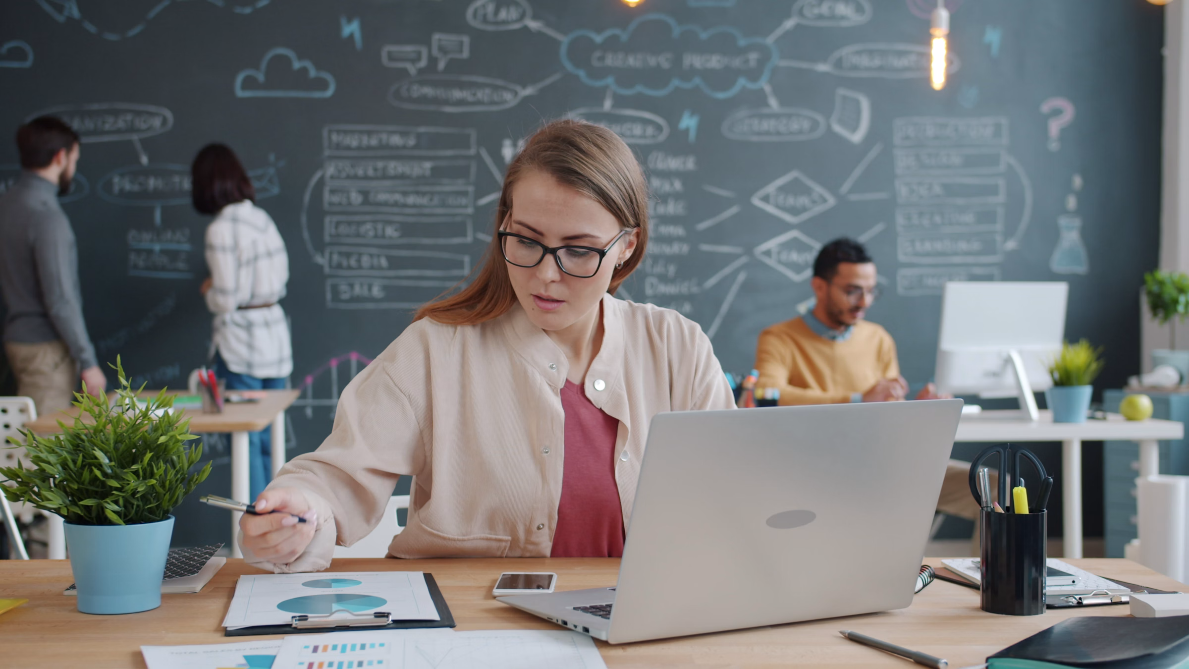 Business professional planning and analyzing work representing sales and management CRM workflows