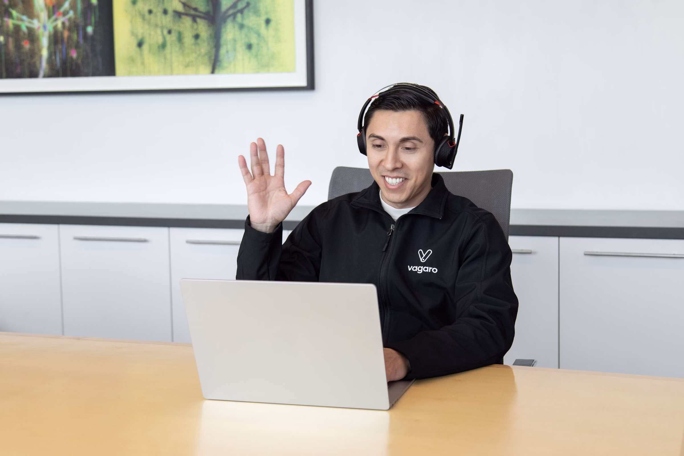 Customer service professional on a video call representing CRM support workflows