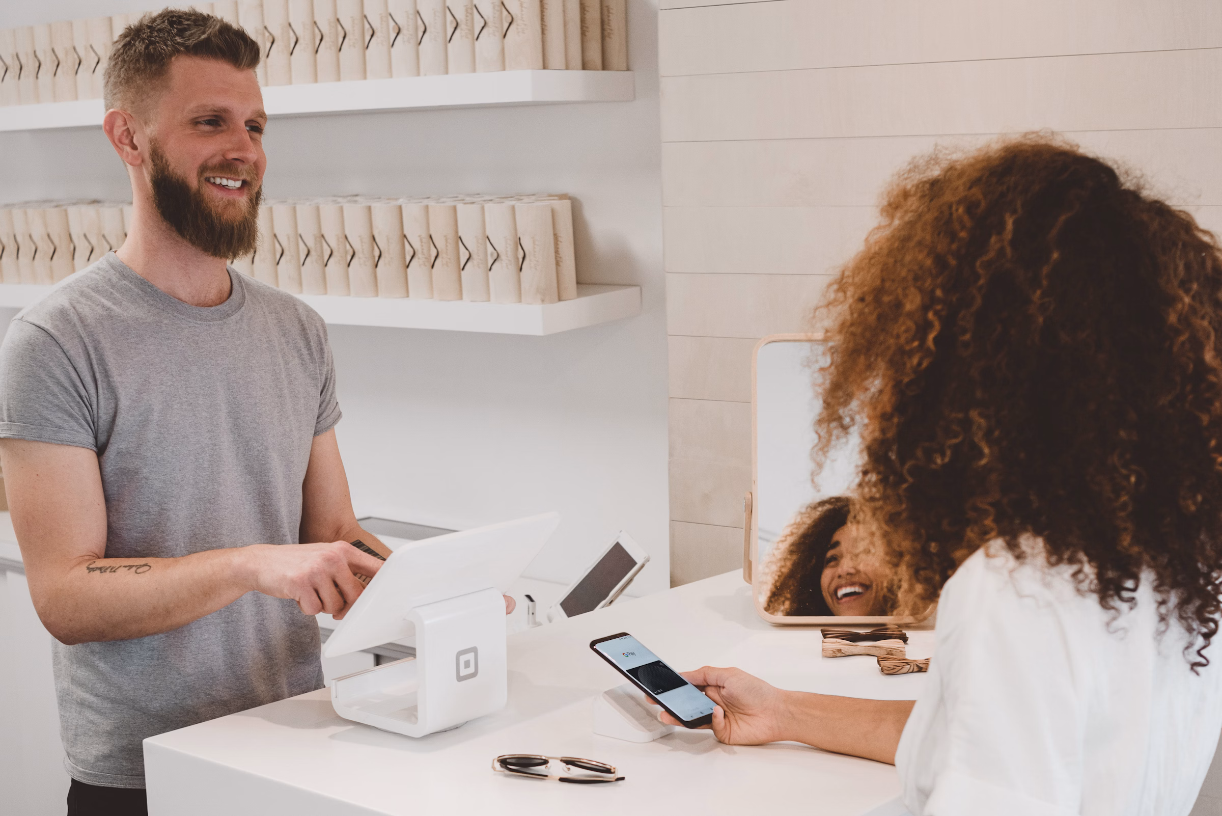 Card payment at checkout representing the purchase transaction