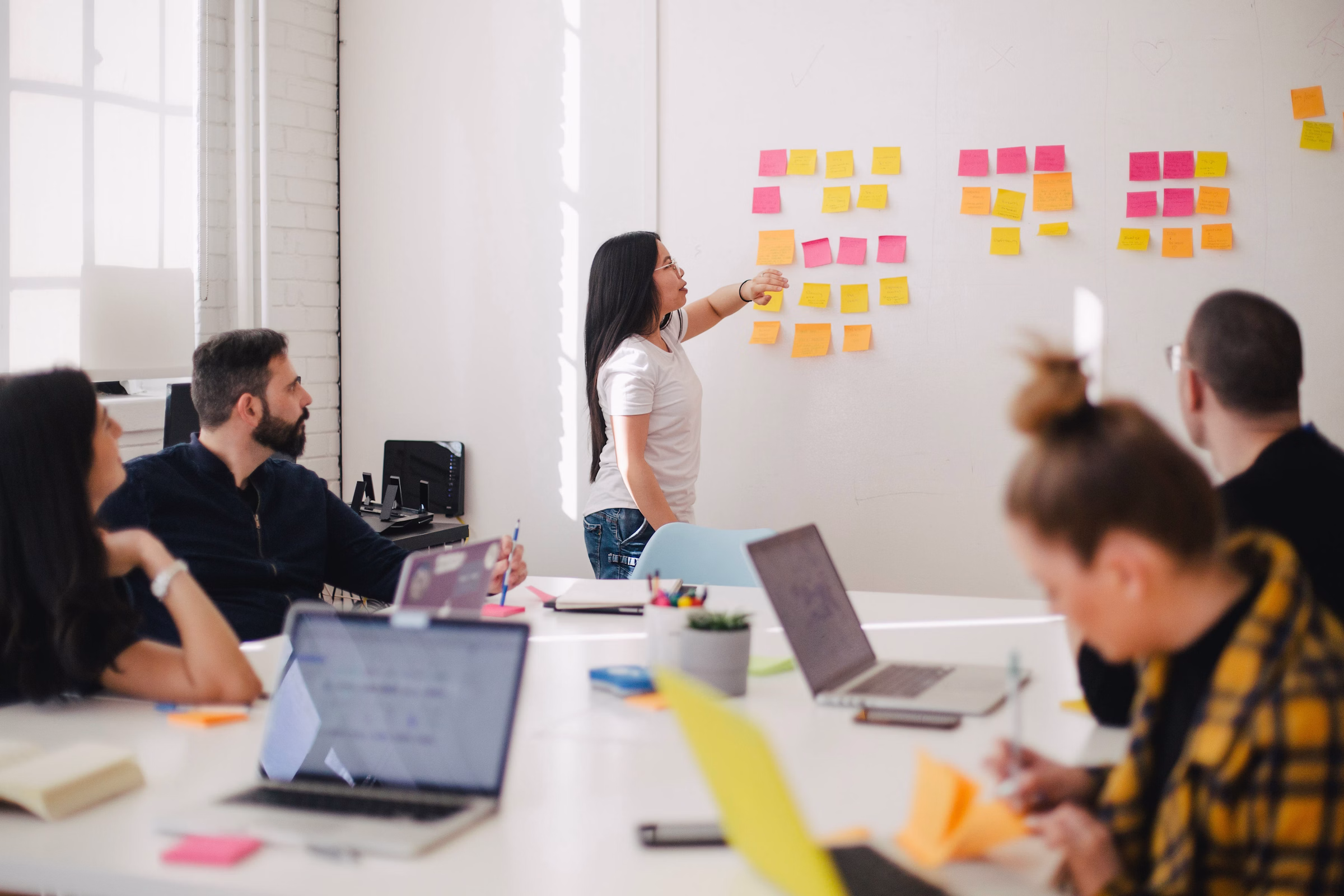 Enterprise software planning workshop with teams mapping workflows