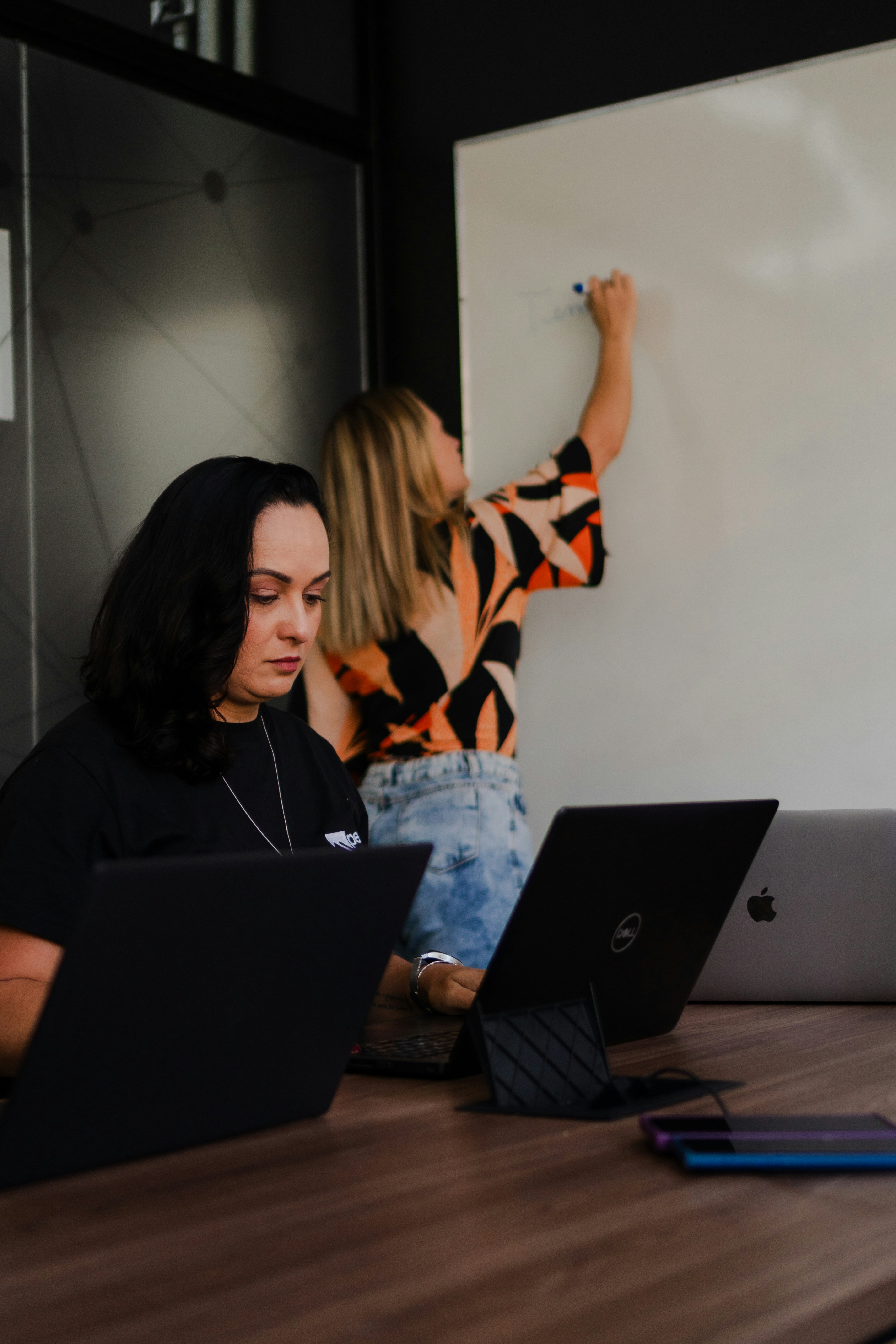 Software product team working near a whiteboard